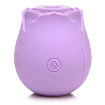 Compact pink silicone rose-shaped clitoral suction stimulator with a single button control on the base.