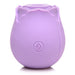 Compact pink silicone rose-shaped clitoral suction stimulator with a single button control on the base.