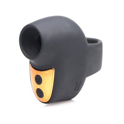 Compact black silicone mini suction stimulator with gold control panel and finger loop for easy use.