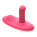 Pink silicone hands-free grinding pad with a ribbed base and a rounded rotating shaft for versatile stimulation.
