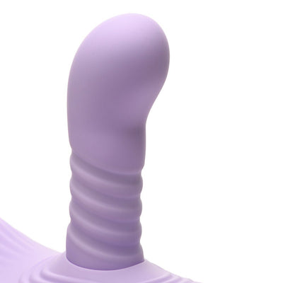 Close-up of the curved, ribbed purple silicone tip of the Inmi Thrust N Grind vibrator.