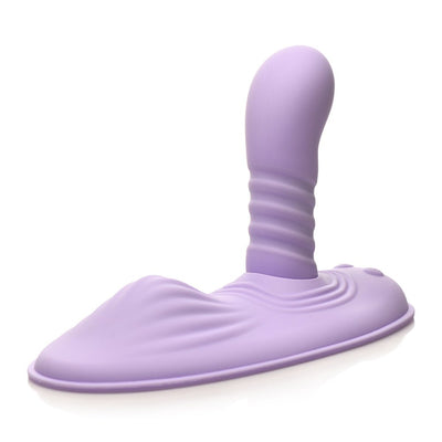 Purple silicone wearable vibrator with textured shaft and flexible base designed for hands-free stimulation.