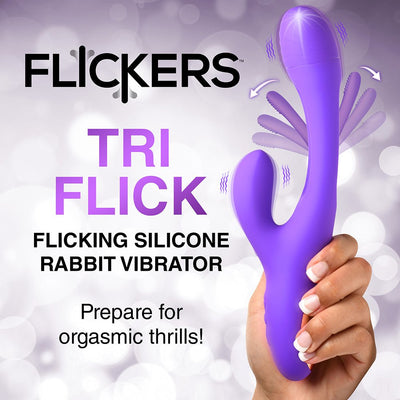 Hand holding a purple silicone Tri Flick rabbit vibrator with flicking and vibrating features highlighted.