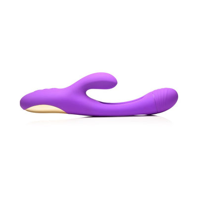 Purple silicone rabbit vibrator with curved shaft and flicking arm, designed for multiple stimulation points.