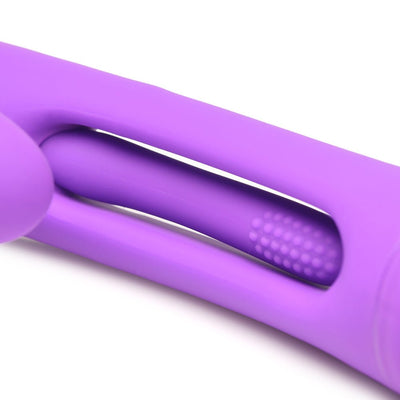 Close-up of the purple Inmi Tri Flick vibrator's flexible flicking arm with textured nubs, made from smooth silicone.