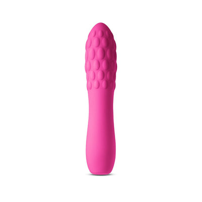 Pink textured silicone vibe with rounded tip and smooth handle, standing upright on white background.