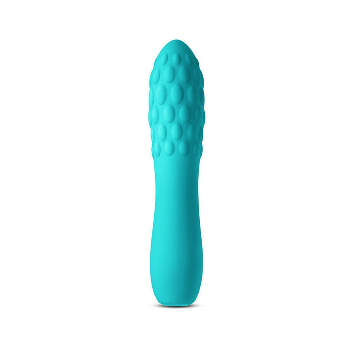 Turquoise textured silicone vibrator with rounded tip and ergonomic shape, designed for discreet travel use.