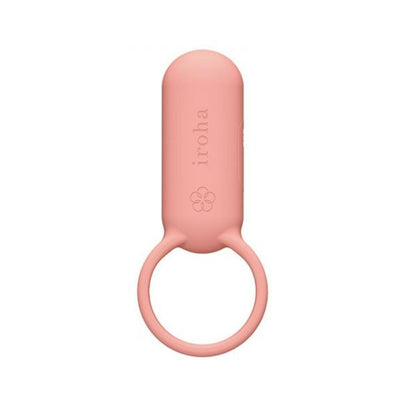 Compact pink silicone vibration ring with a smooth capsule design and a circular loop for easy handling.