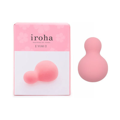 Pink snowman-shaped Iroha Yuki Nadeshiko Color vibrator with soft silicone finish next to its matching pink floral packaging box.