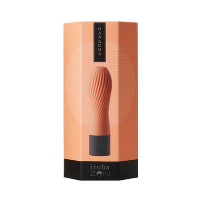 Iroha Zen mini vibrator in citrus orange with textured silicone surface displayed on matching orange packaging.