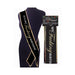 Black birthday sash with gold trim and bold white and gold lettering reading It's My Birthday, displayed on a mannequin and in packaging.