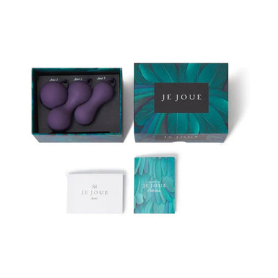Set of three purple silicone kegel exercisers in a decorative box with instruction booklets by Je Joue.