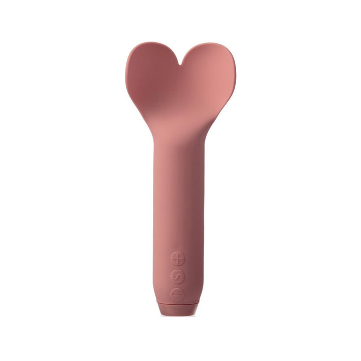 Heart-shaped tip bullet vibrator in soft pink silicone with control buttons on the handle.