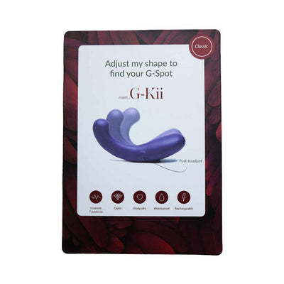 Packaging of Je Joue G-Kii Dual Stimulator showing adjustable curved design and key features icons on a dark floral background.