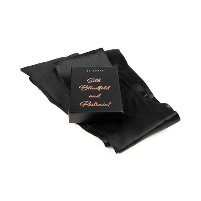 Je Joue black silk blindfold and restraint set with elegant rose gold lettering on the box.