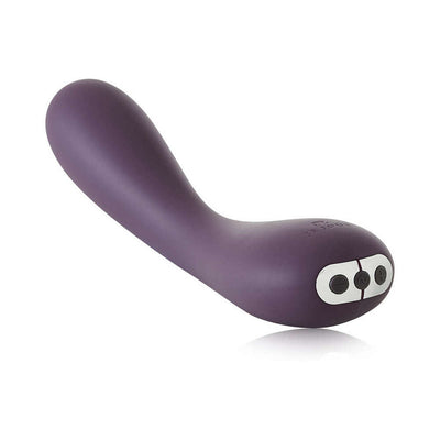 Purple silicone Je Joue Uma G-spot vibrator with ergonomic curve and control buttons on the base against white background.
