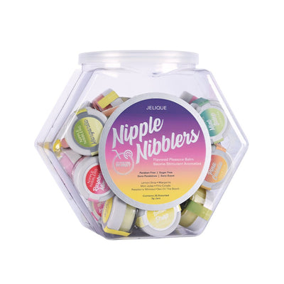 Clear hexagonal tub filled with assorted Jelique Nipple Nibblers cocktail flavored pleasure balm jars.