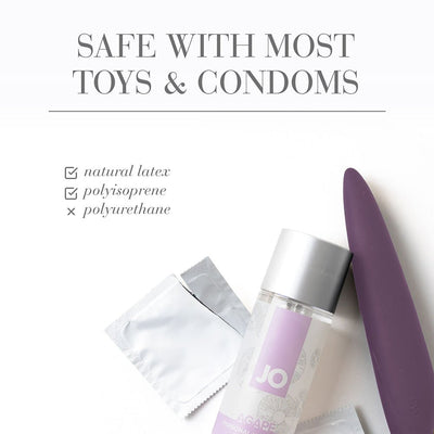 JO Agape Original lubricant bottle with purple personal massager and condom packets on white background, safe with most toys and condoms text.