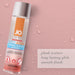 Bottle of Jo Anal H2O Warming water-based personal lubricant on pink background with water droplets and product benefits text.