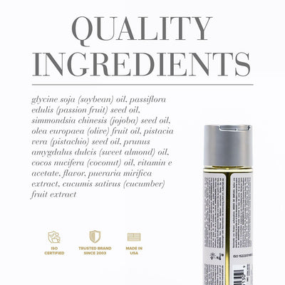 Bottle of Jo Aromatix Massage Oil with a list of natural ingredients and quality certification icons on a white background.