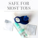 JO Fresh Scent Misting Toy Cleaner bottle with a blue silicone ring toy and two sealed packets on a white background.