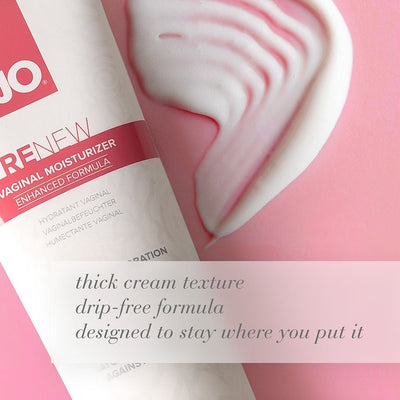 Tube of JO Renew Vaginal Moisturizer with thick cream texture on pink background highlighting drip-free formula.