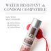 Bottle of Jo Silicone Free Hybrid Coconut Warming Lubricant with red liquid splash, highlighting water resistance and condom compatibility.