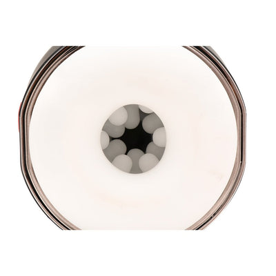 Close-up view of the textured white inner tunnel of the Jock 15x Sucking & Vibrating Masturbator.