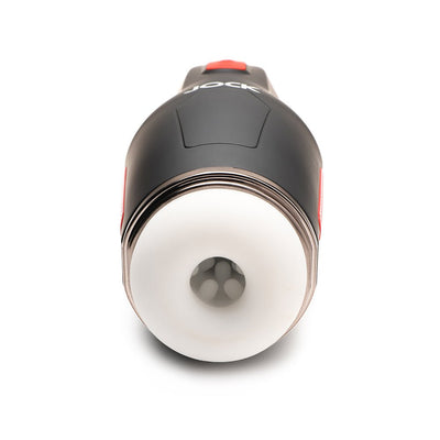 Black and white Jock 15x sucking and vibrating masturbator with silicone grip and textured inner tunnel visible from front view.