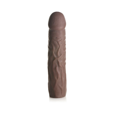 Dark brown extra long penis extension sleeve with lifelike texture and solid tip on white background.