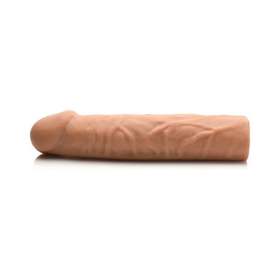 Realistic flesh-toned penis extension sleeve with detailed veins and a hollow shaft for added length and girth.