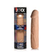 Light skin tone extra long penis extension sleeve with realistic texture next to its clear packaging labeled Jock 3 inch extension.