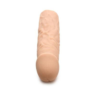 Light skin tone penis extension sleeve with realistic texture and 3-inch length, made of flexible premium TPE material.