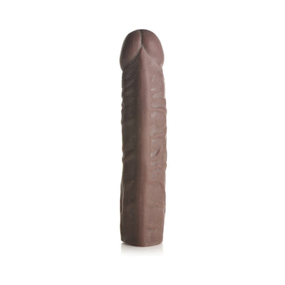Medium-sized dark brown penis extension sleeve with lifelike texture and hollow design on white background.