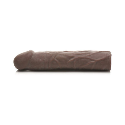 Medium brown flexible penis extension sleeve with lifelike texture and detailed veins, 3-inch length increase.
