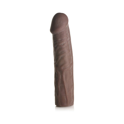 Medium brown flexible penis extension sleeve with lifelike texture and detailed design, standing upright on white background.