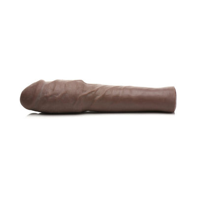 Dark brown extra thick penis extension sleeve with realistic texture and hollow design, shown on white background.