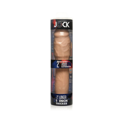 Jock Extra Thick 2-inch light-colored penis extension sleeve in clear cylindrical packaging with black and red label.