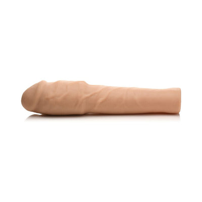Light-colored extra thick penis extension sleeve with realistic texture and hollow design for enhanced fit and comfort.