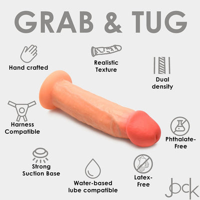 Light skin tone silicone dildo with realistic texture and suction base, surrounded by icons highlighting features like handcrafted, dual density, and harness compatible.