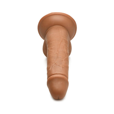 Realistic dark-toned 7-inch dildo with suction base and detailed texture for hands-free use.