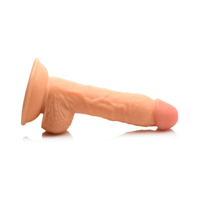 Realistic 7-inch flesh-toned dildo with suction base and textured surface for versatile use and comfort.