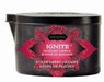 Kama Sutra Ignite Massage Candle 6oz in black tin with red decorative label, strawberry dreams scent.