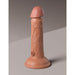 Realistic dual-density silicone dildo in natural skin tone with suction cup base standing upright on a neutral surface.