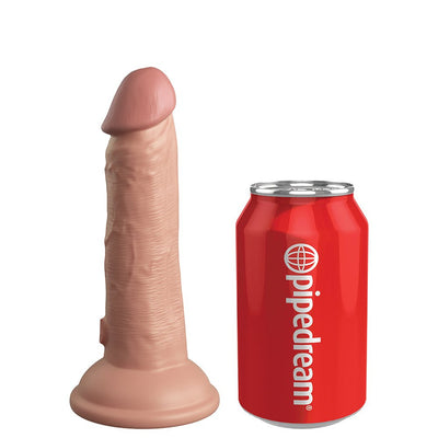 Realistic 6-inch King Cock Elite vibrating silicone dildo next to a red Pipedream soda can for size comparison.