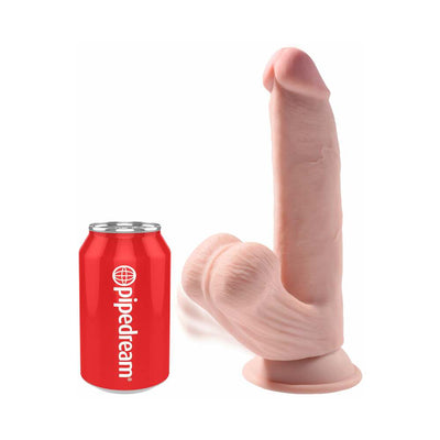 Realistic 8-inch triple density dildo with swinging balls and suction base next to a soda can for size comparison.