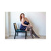 Plus size model seated wearing Kixies Sierra opaque grey thigh-high stockings with black stripe detail and navy satin slip dress.