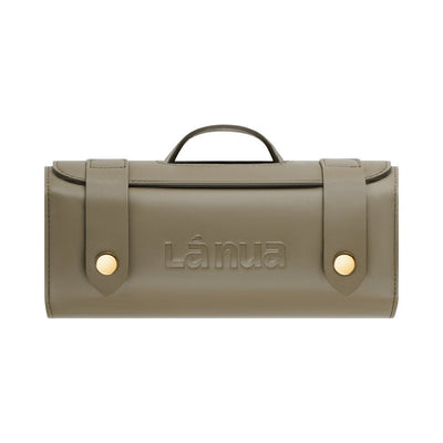 La Nua branded taupe leather gift bag with handle and gold snap buttons, closed and compact design.