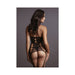 Woman wearing black lace suspender bodystocking with cut-out details, shown from the back against a gray background.