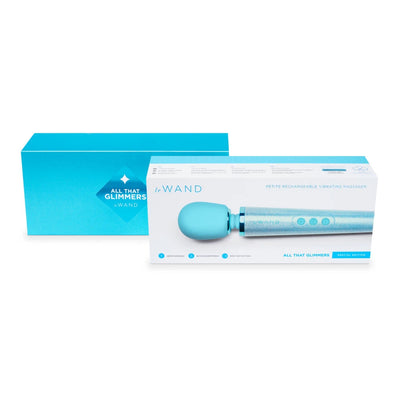 Le Wand All That Glimmers Petite rechargeable vibrating massager in glittery blue with matching blue packaging box.